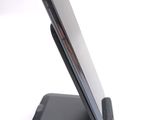 a cell phone that is sitting on top of a stand