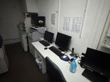 two computers on the desk in the room