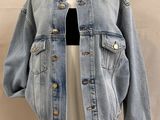 denim jacket on a mannequin dummy on a mannequin stand