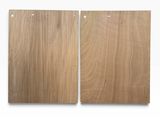two pieces of wood with holes in them on a white background