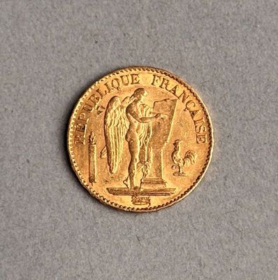 une pièce d'or portant l'image d'un homme et d'une femme