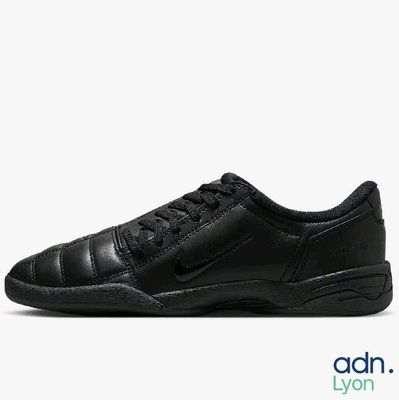 the nike court royale is black and has a low top