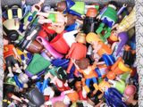 a box full of toy figurines that are in a box