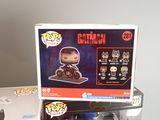 a box with a pop vinyl figure on top of it