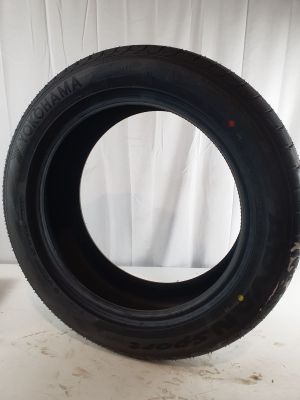 a close up of a tire on a white surface with a white background