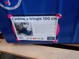 a blue box with a sign on it sitting on a pallet