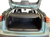 the back of a car with its trunk open showing the cargo compartment