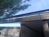 a truck that is parked in front of a building