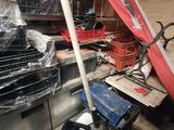 a picture of a kitchen with a lot of clutter on the counter