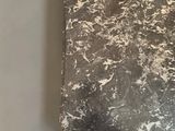 a black and white marble case on a white table
