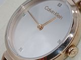 a close up of a wrist watch on a table
