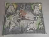 a picture of a cloth with a picture of a man and a woman on it