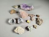 many different types of rocks and stones on the table