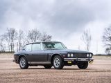 an image of a classic car parked in a field