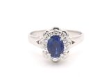 an oval sapphire and diamond ring in white gold