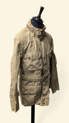jacket on a mannequin stand on a white background