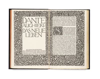 an open book with a black and white design on it