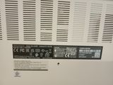 a close up view of the back panel of a refrigerator
