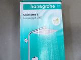 a box that has a shower head and a hose in it