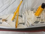 a model of a boat that is on a table