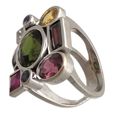 BAGUE en or gris et pierres fines et un diamant