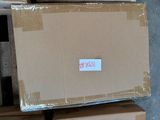 a stack of boxes sitting on top of each other in a warehouse