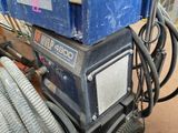 an image of a machine that is sitting on top of a cart
