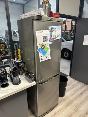 a refrigerator that has a lot of things on it