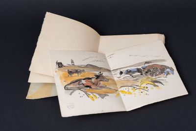 an open book with a picture of a horse and rider on it