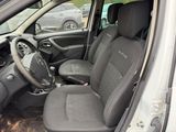 the interior of a car with the front seats down and the steering wheel down