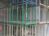 a room with a lot of shelves in it