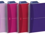 a set of five spiral notebooks in different colors