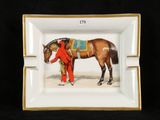 a plate with a picture of a horse on it