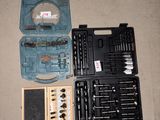 a tool kit that is laying out on the floor