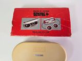 a box and a pair of glasses on a table