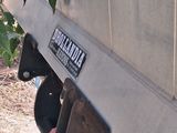 a close up of a truck with a sign on it