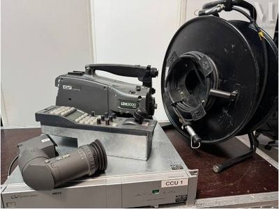 a camera and a microphone sitting on a table