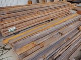 many pieces of wood stacked on top of each other