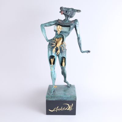 an image of a statue of a woman holding a cat
