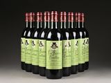 six bottles of red wine are lined up in a row