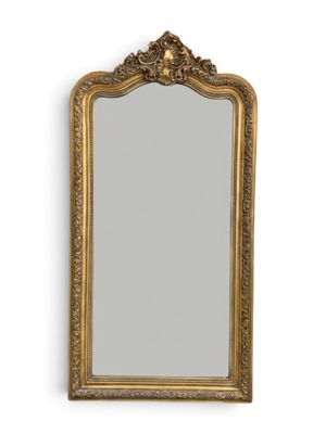 un miroir à cadre doré orné d'un motif décoratif sur le pourtour