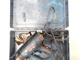 a tool in the case that is sitting on the floor