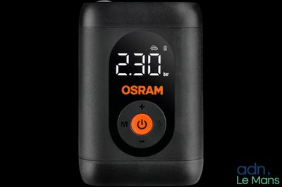 a close up of a cell phone with a clock on it