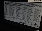 a close up of a qr code on the back of an oven