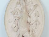 a white plate with a picture of a woman and a dog