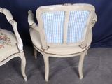 pair of antique chairs with blue and white checkered upholstered cushions