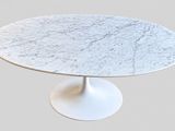 une image représentant une table en marbre blanc sur un piédestal blanc