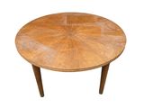 an image of a round table with a wooden top