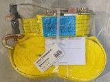 a yellow rope with a blue tag and a pair of scissors