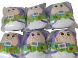 six bags of toy story book pillows in plastic wrappers